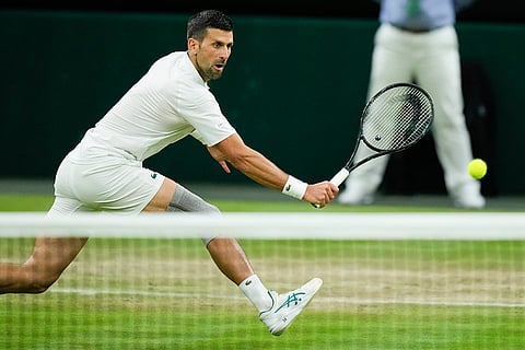 Novak Djokovic of Serbia plays a return
